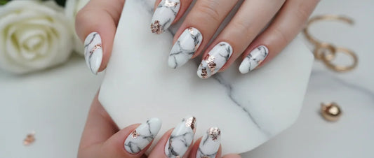 Last chapter glow: Marble nails becoming the standout maximalist trend for the year’s finale